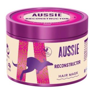 Mascarilla capilar Aussie Reconstructora de 500 ml para revitalizar e hidratar el cabello seco y dañado.